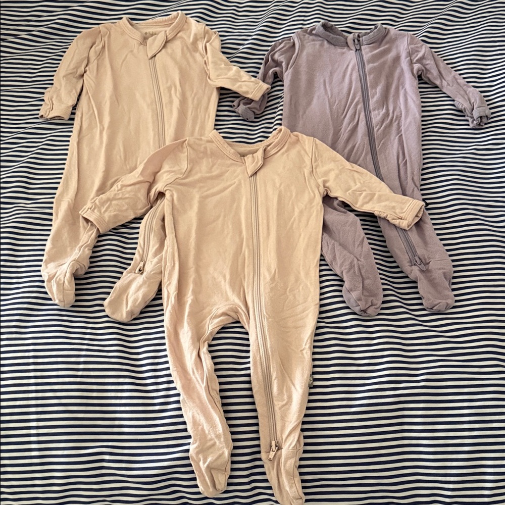 Kyte BABY Footies in pink and purple